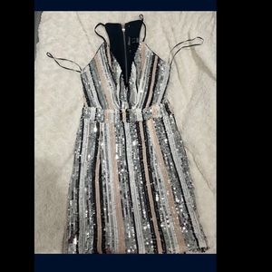 Sequin dress with ribcage cut out